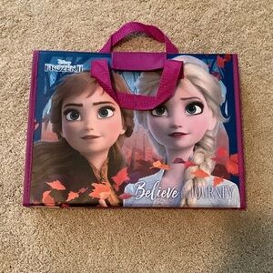 Frozen notebook like a trapper keeper. Great for on the go fun. Car rides.